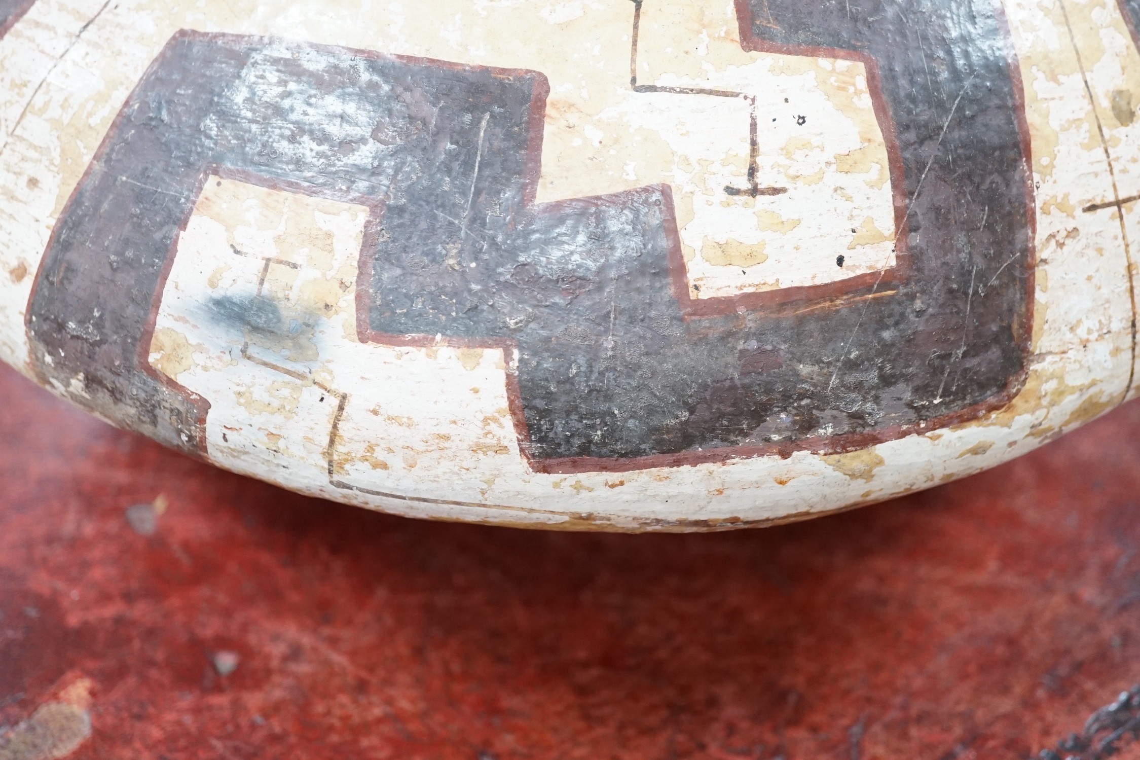 A Shipibo pottery water vessel with geometric pattern, Peru, 26cm tall